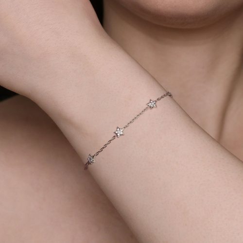 Bracciale sottile con stelline luminose al polso